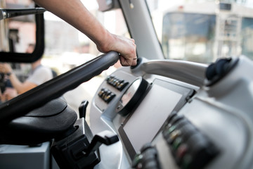 Seat and steering wheel. Bus driver