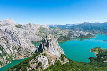 Naklejka na ściany i meble Peaks of Europe in Spain from Riaño reservoir