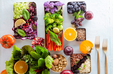 Selective of fall winter antioxidant ingredients and vegetables, cereals rich of anthocyanins, oligominerals for healthy seasonal cooking on colored background