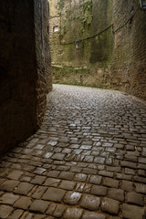 small alley, medieval castle. Sedan, France. Chateau de Sedan.