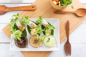 Rice paper salad rolls with carrot,sunflower sprout, corn and crab stick