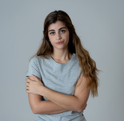 Fototapeta premium Portrait of sad and depressed woman. Isolated in white background. Human expressions and emotions