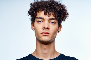 Obraz premium portrait of a young beautiful man with perfect skin