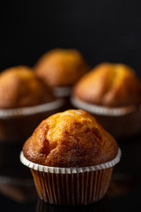 Tasty muffin closeup on a dark backgrownd