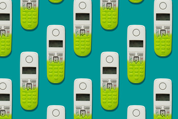 Pattern image of DECT phones turning into a toy phones on blue background. The concept of technology obsolescence.