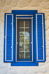 an old wooden window of an old house