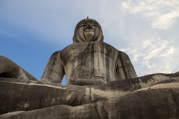  Buddha face in blue sky background, Buddha statue in Thailand.
