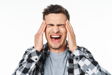 portrait of a man with headache isolated on white