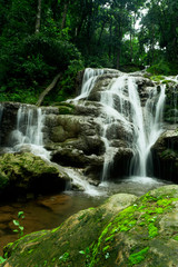 Fototapeta na wymiar Waterfalls in the rainy season, wetness in the rainy season