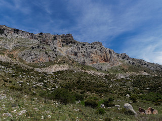 Fototapeta na wymiar The Limestone mountains of Sierra del Torcal in the El Torcal Natural Park high up in Andalucia, Spain on a May afternoon. Espana