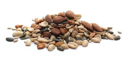 Healthy food mix of salted and spicy peanuts, sunflower and pumpkin seeds, almonds isolated on white background