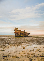 old fishing boat on the beach