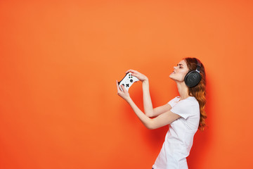 female gamer with a gamepad © SHOTPRIME STUDIO