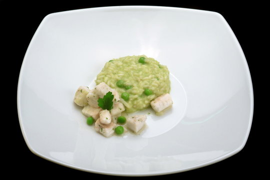 Italian food recipes, risotto with tench and peas.
