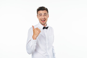business man joyful shows thumbs up