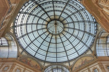 Interior of the gallery Victor Emmanuel with expensive boutiques in Milan