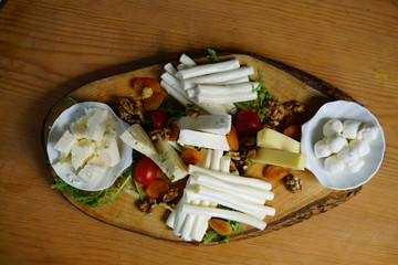 cheese plate prepared with various cheeses