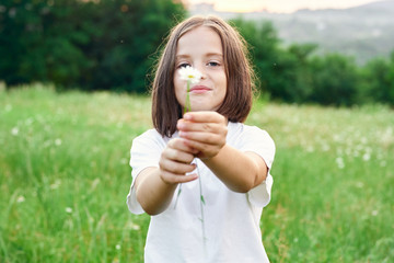 girl eating ice cream in park