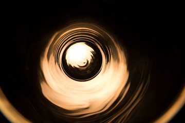 abstract circle from an illuminated glass cup