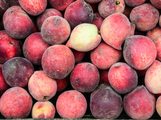 Close-up of peach fruits at the rural market