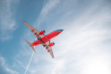 Fototapeta na wymiar San Diego, USA, 2018. Plane in the sky. Aviation, travel air transportation concept