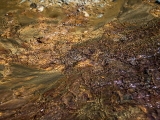 dirty brook and rusty water