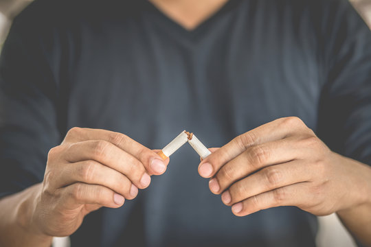 Man refusing cigarettes concept for quitting smoking and healthy lifestyle.or No smoking campaign Concept.	