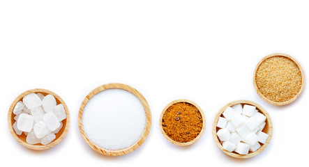 Various types of sugar on white background.