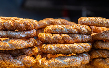 Traditional bagel turkish simit, sesame bread rings, street food closeup view