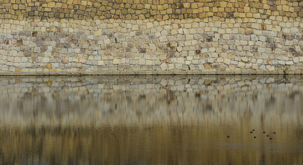 Ancient stone wall of Japanese castle