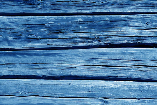 Old wooden wall in navy blue color.