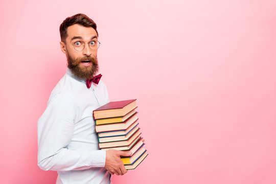 Photo of intelligent positive comic humorous genius in eyewear enjoying loves reading mad of science isolated pastel background copy space