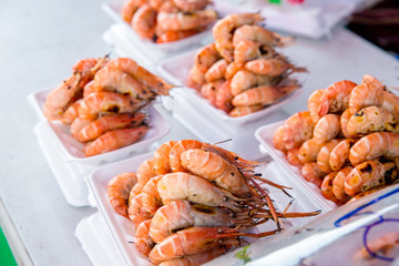 Prawns or shrimp grilled on charcoal stove. shrimp grilled bbq seafood on stove.Closed up river prawn charcoal grilled on stove with Thai style homemade.
