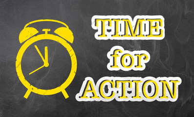 text TIME FOR ACTION on chalkboard with alarm clock icon