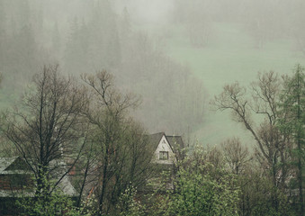 Mountain shelter in Valley in Tatras mountains. Bad weather in Zakopane. © Irina84