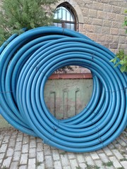 pipes and valves/ construction material/ waterpipes round and blue