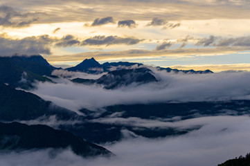 Fototapeta na wymiar The clouds sea and sunrise in the mountains in West Sichuan, China.