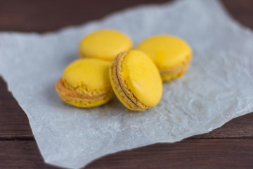 macaroons, delicious almond cookies on wooden background