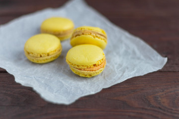 macaroons, delicious almond cookies on wooden background