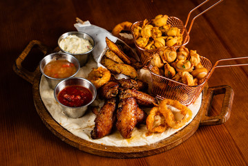 Large beer plate  on the wooden background