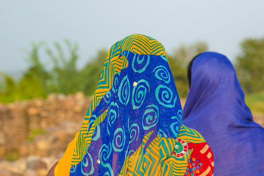 Women Wear The Colorful Headscarfs With Traditional Pattern In The Heat Of India