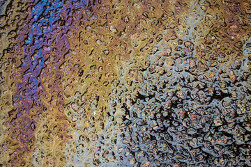 Spilt Oil Petrol Pollution Leak Rainbow Leak on a Road