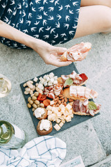 Bruschettes and a picnic with prosciutto. Italian-style blogger with cheese and meat.