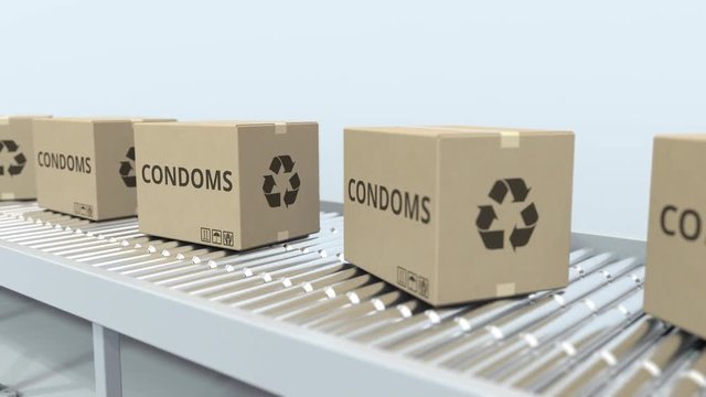 Cartons with condoms on roller conveyor. Loopable 3D animation