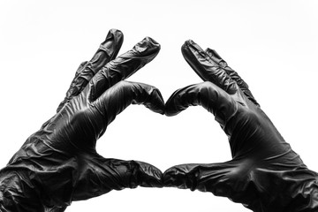 Female hands in black gloves show gestures, signs and symbols isolated on white background. Two...