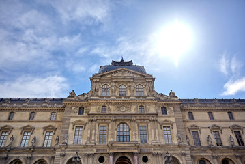 Paris, France - April 21, 2019 - A view of the Louvre Museum, the world's largest art museum and a historic monument in Paris, France, on a sunny day.
