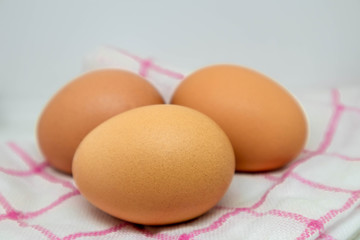 Three eggs on the fabric