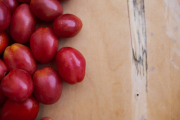 fresh colorful tomatoes in different forms collected at the farm. vegetables with defect: dark...