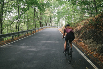Riding up the Belkovice valley and the switchbacks of the steep road to Dalov