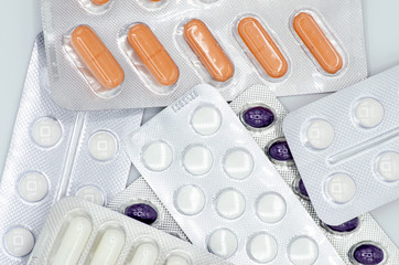 Different medicines: tablets, pills in blister pack, medications drugs, macro, selective focus